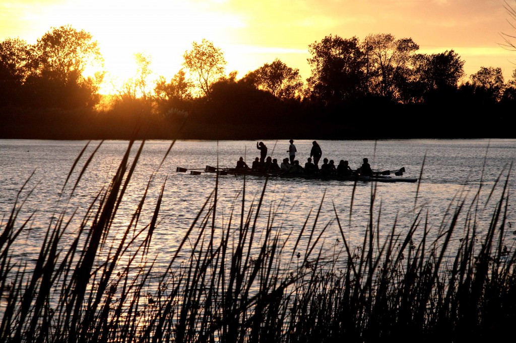 2011 Boats & BBQ Attendees learning how to row at sunset