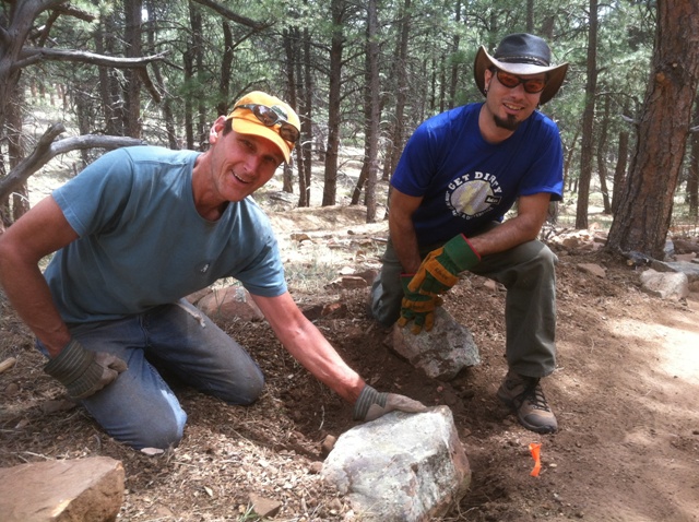 Volunteers rock....literally! Volunteers doing rock work along the Wapiti Trail
