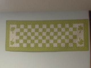 Scrappy Four-Patch Shamrock Table Runner